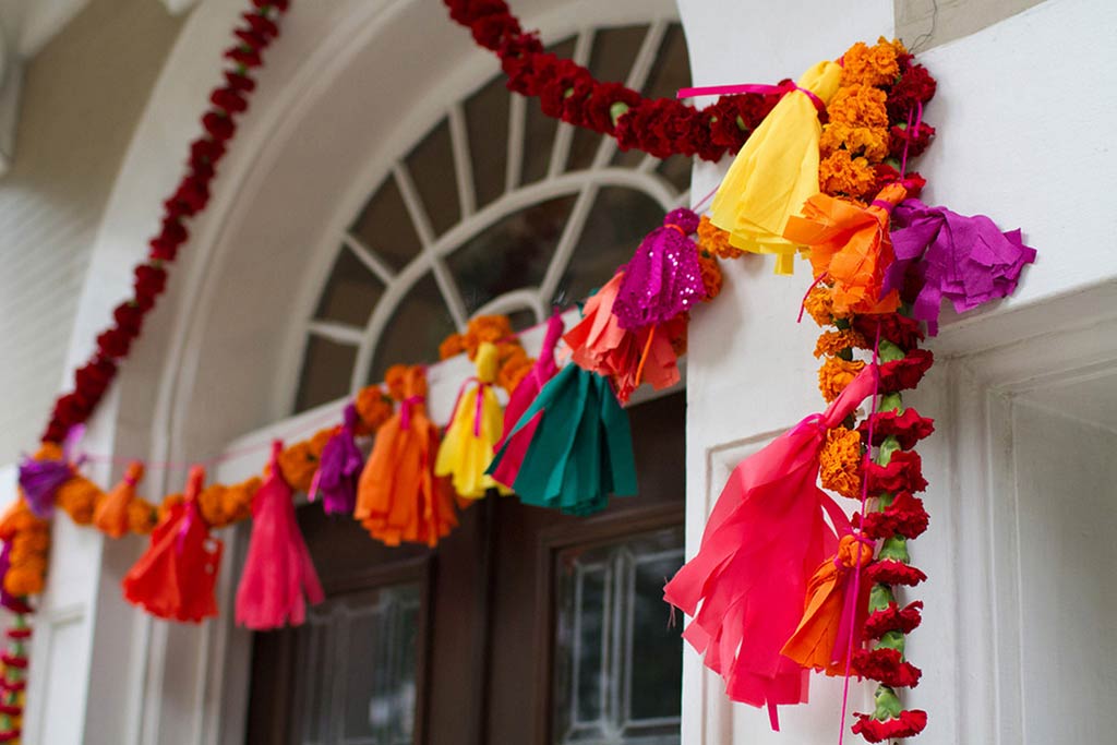 Entryway floral garland and tassles for Hindu wedding at Belo Mansion