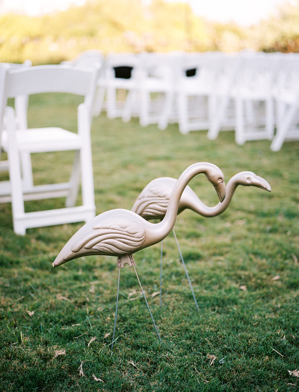 Gold flamingo lawn ornaments used for wedding decor at The Belmont Hotel