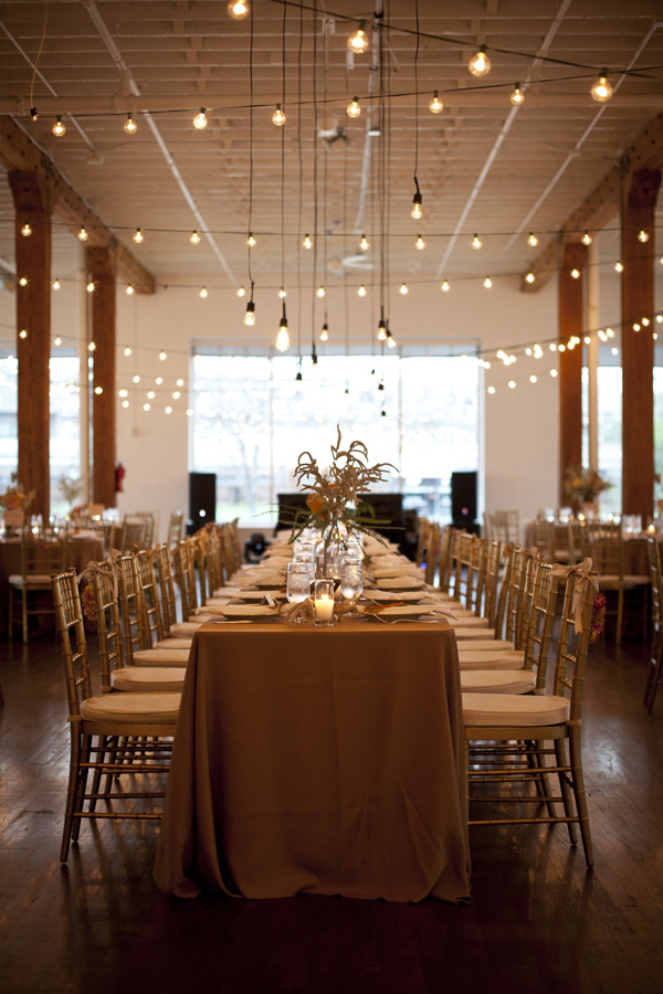 Cafe Lights and Long Head Table at 333 First Avenue Wedding Reception