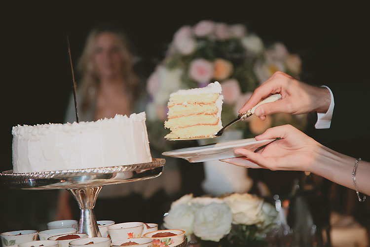 Italing cream cake at wedding reception