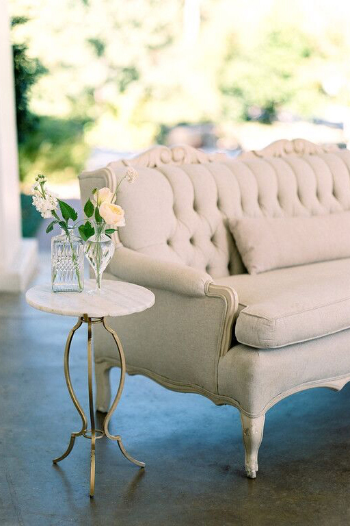 Bella Acento wedding reception sofa and end table on Arlington Hall back porch