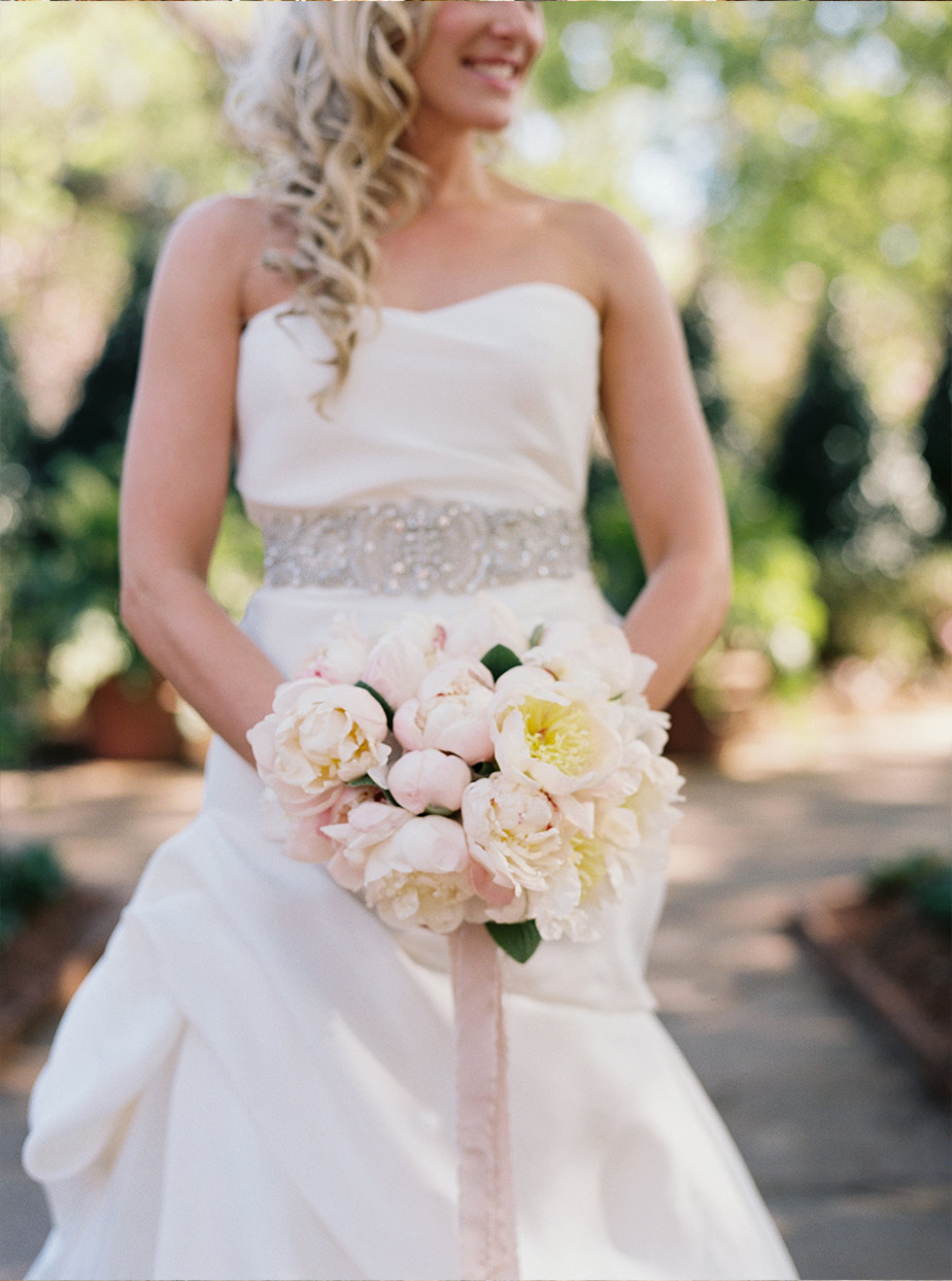 Bridal portrait with white streamer bouquet