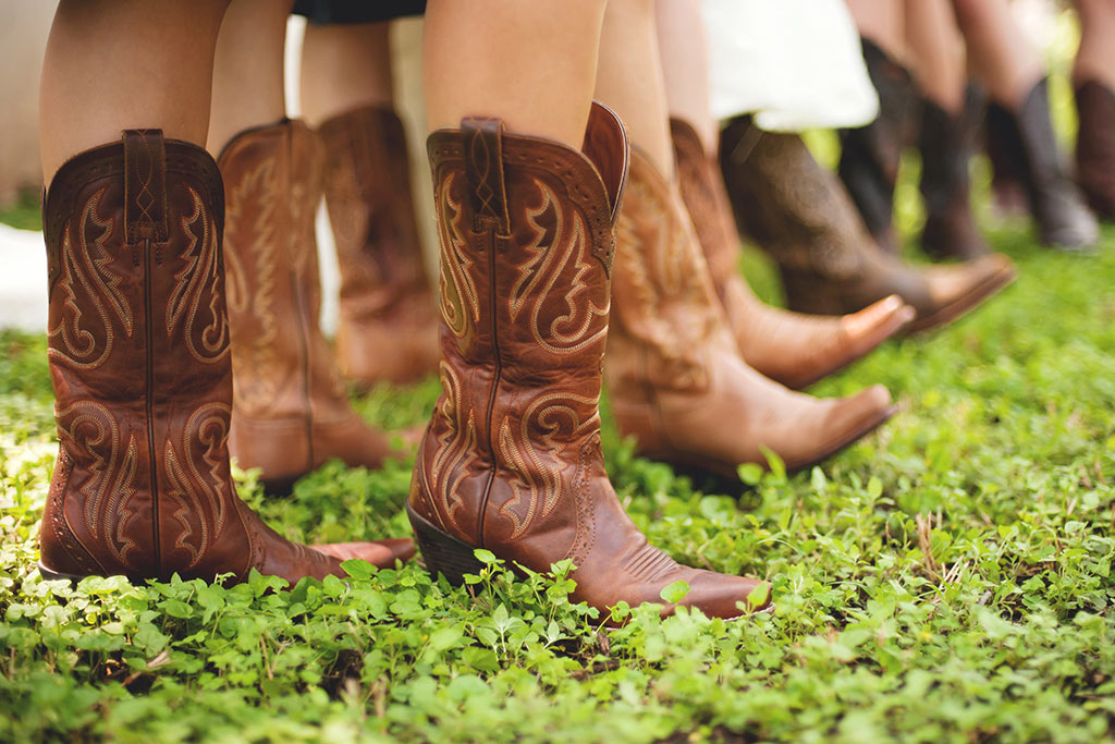 Bridesmaids wearing cowboy boots