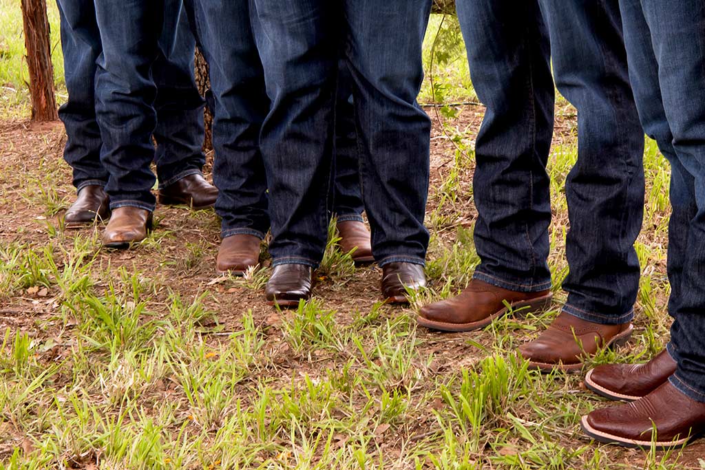 groomsmen wearing cowboy boots