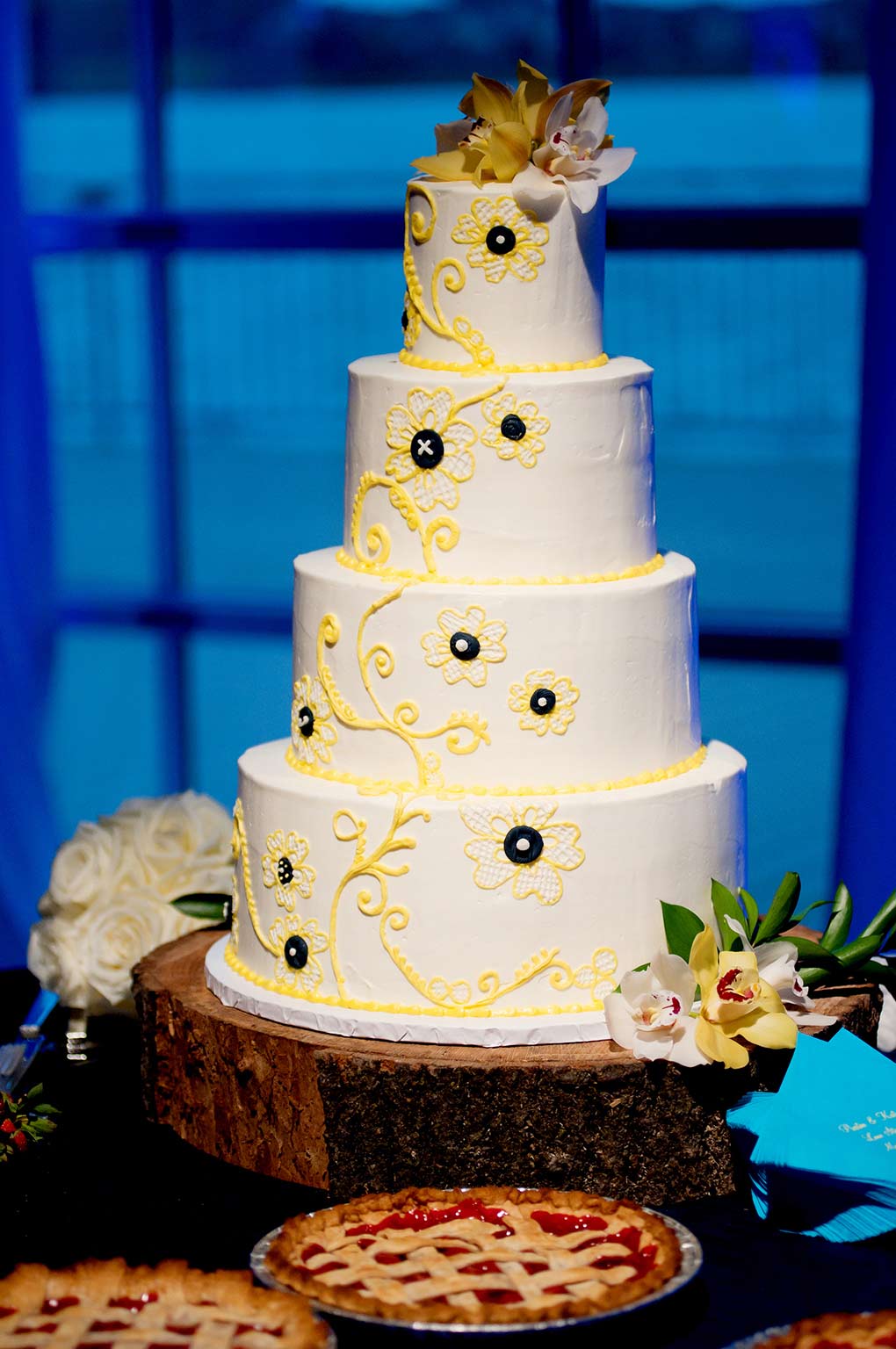 yellow and white wedding cake