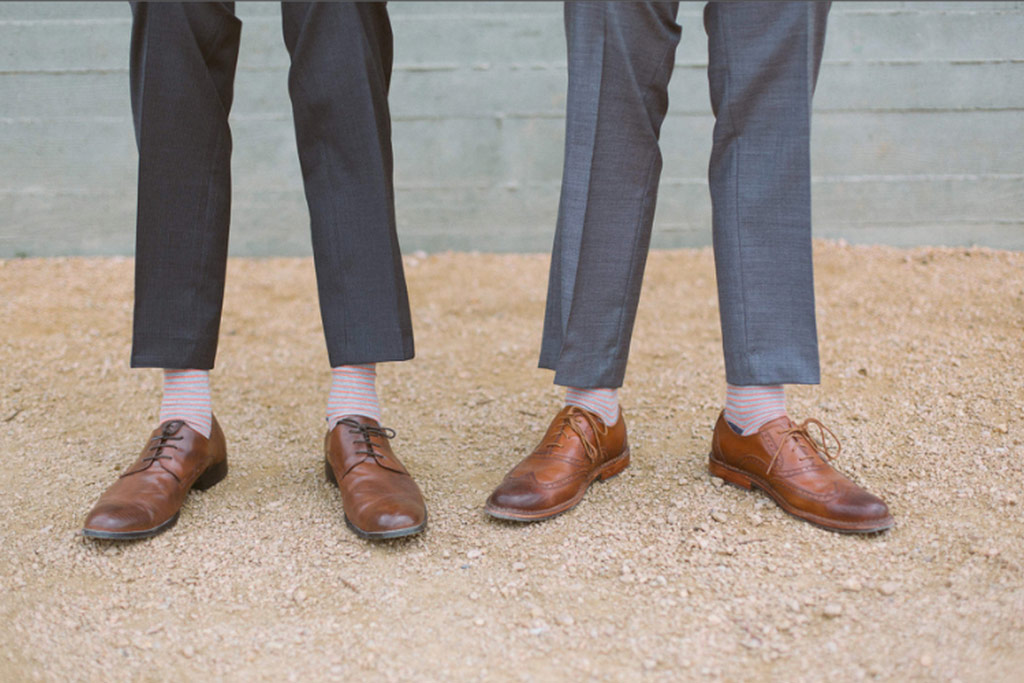 Groomsmen's gray suits with brown shoes