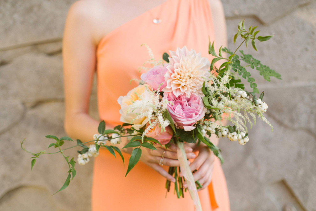 Peach bridesmaid dress and bouquet