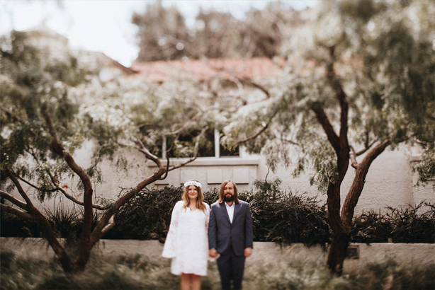 Bride and groom take a wedding day portrait at the Trinity River Audubon Center in Dallas