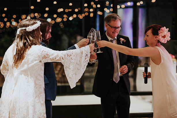A wedding reception toast with champagne
