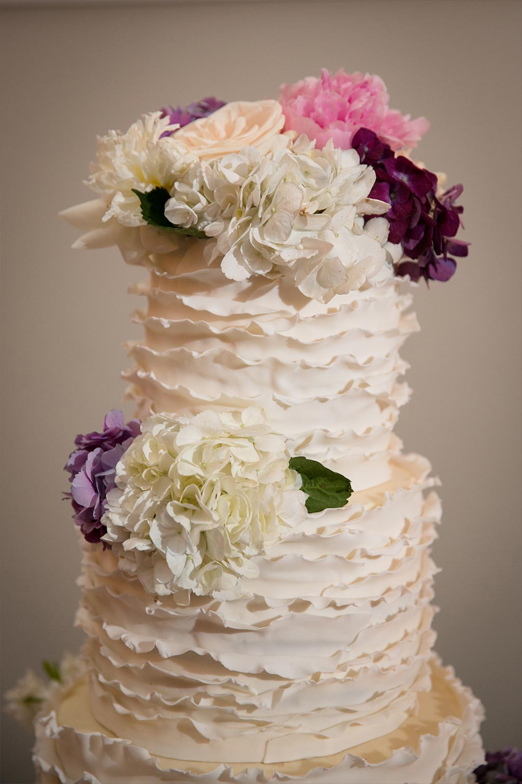 Ruffle Wedding Cake with Floral Topper