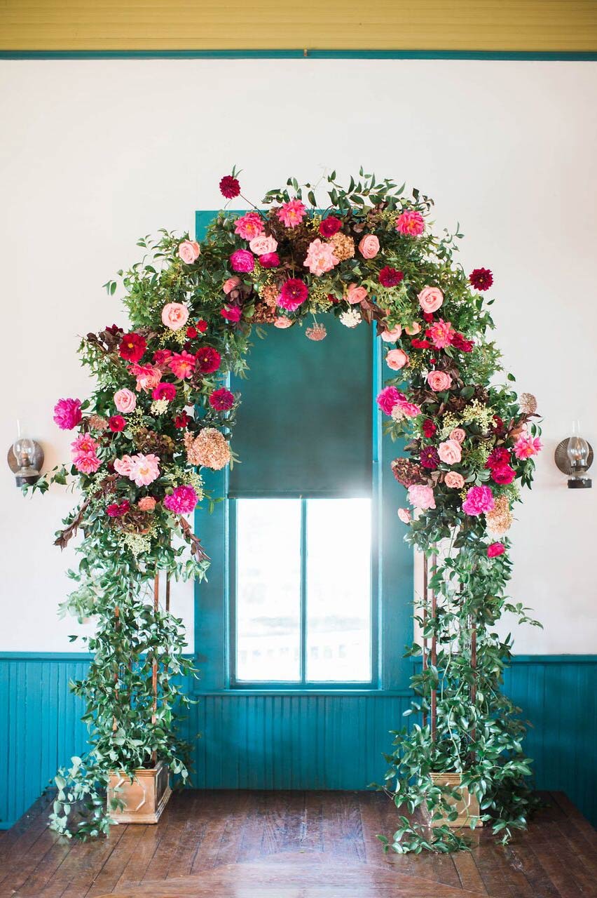 Floral and greenery wedding ceremony arch