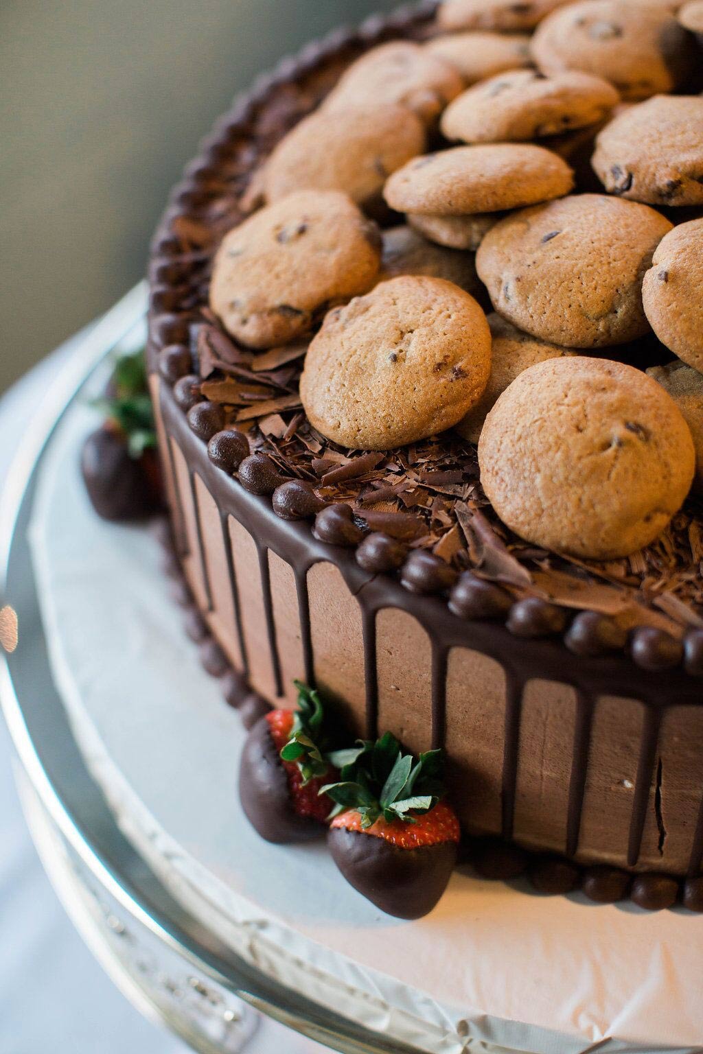 Chocolate grooms cake with cookies on top