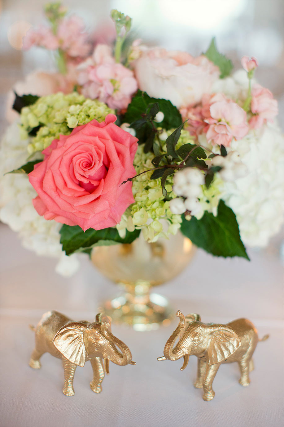 Gold elephant animal statues with low wedding table centerpiece