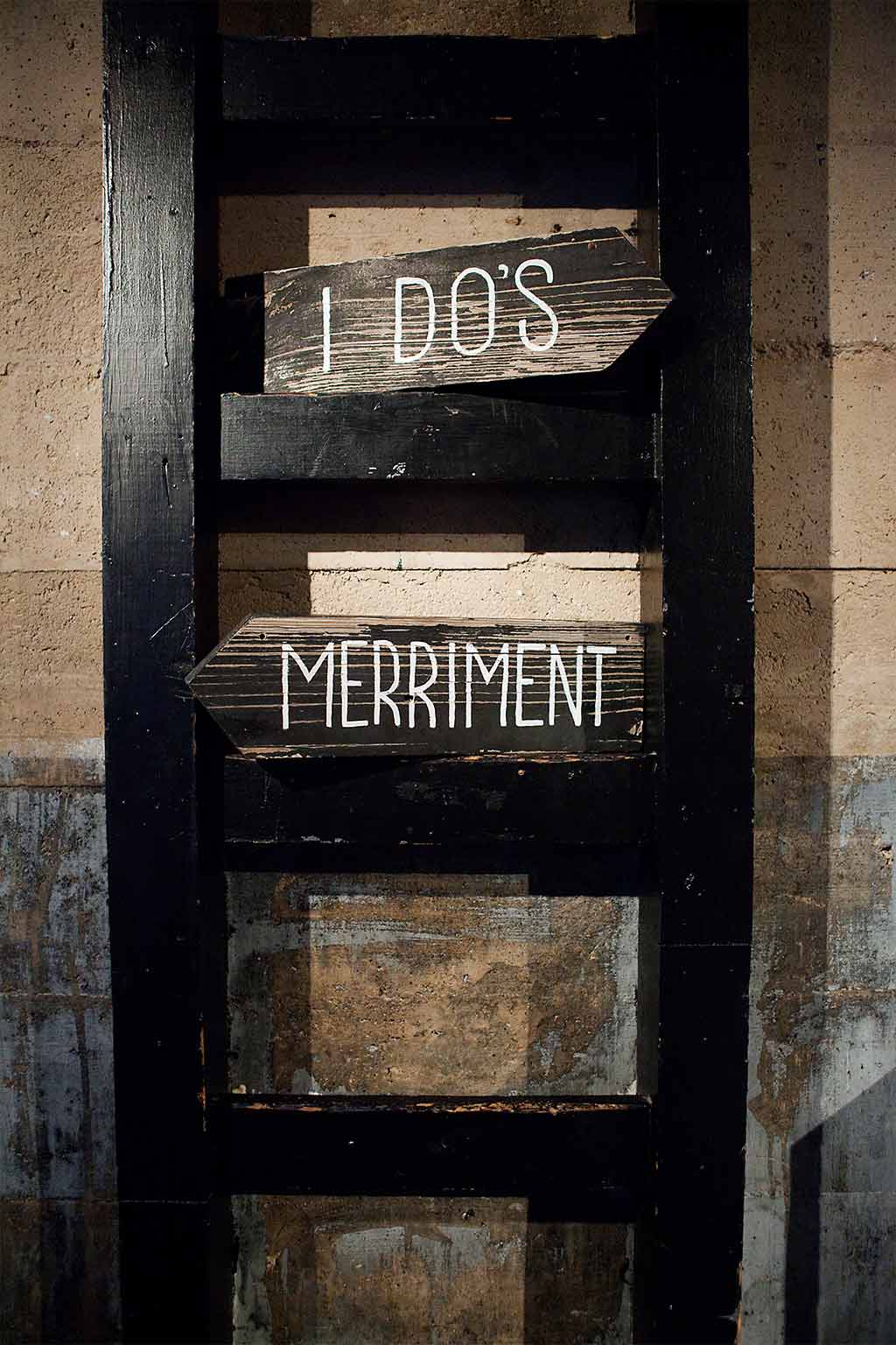 I Dos and Merriment direction hand painted wedding signs
