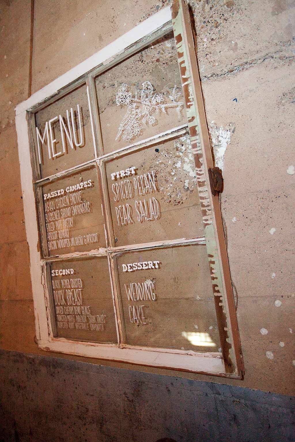 hand painted wedding menu on vintage window panel