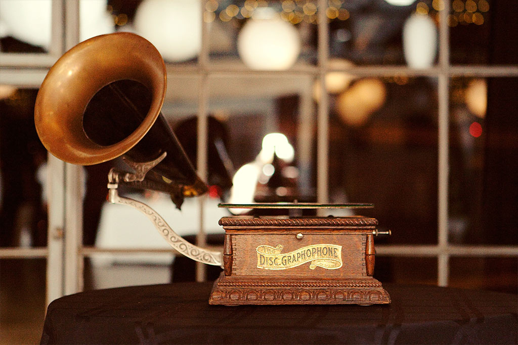 antique gramophone record player playing At Last for wedding reception first dance