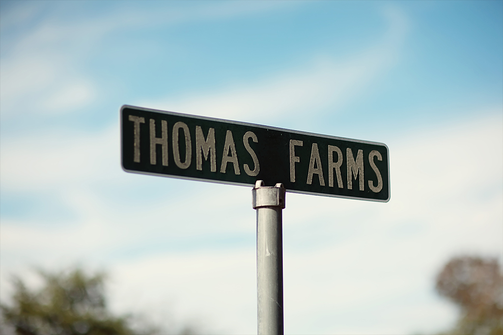 thomas road sign