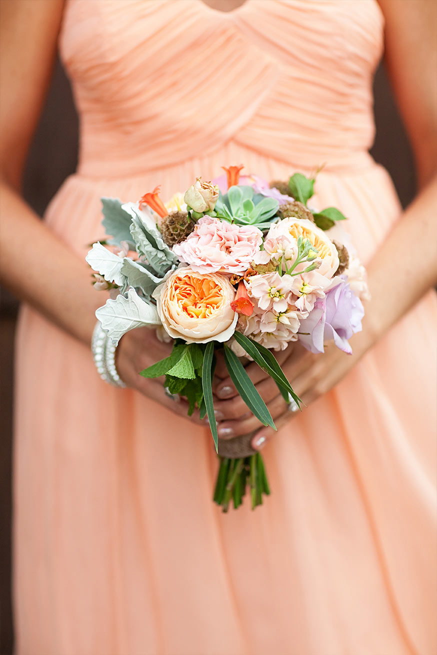 peach bridesmaids' dress and bouquet