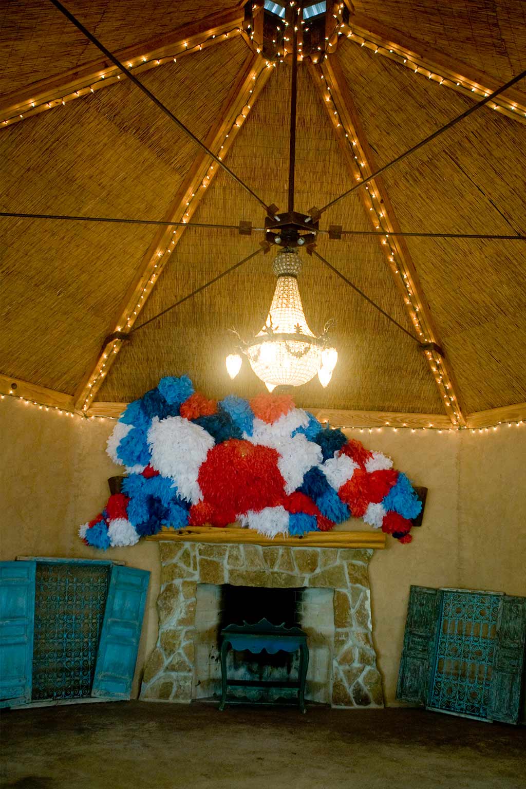 colorful wedding decor on fireplace