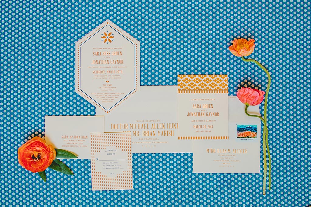 Die cut orange and blue letterpress wedding invitation suite