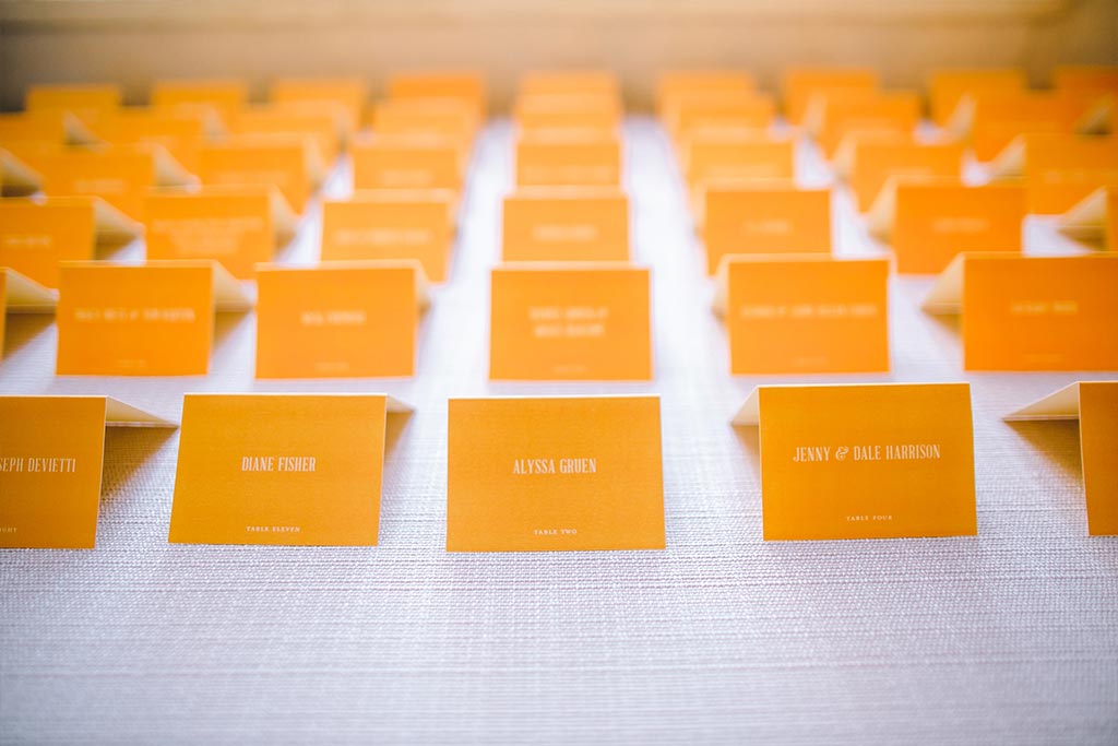 Orange wedding escort cards