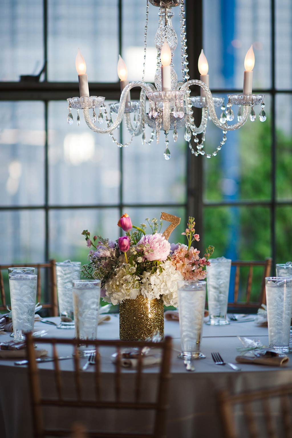 Chandelier above Wedding Reception Table