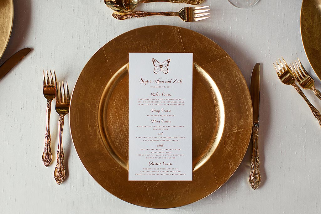 Gold wedding place setting with foil butterfly menu card