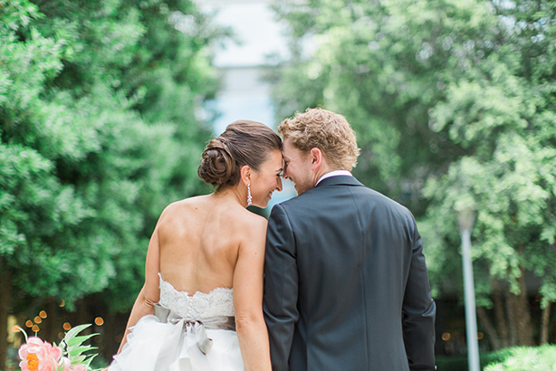 Bride and groom take a wedding day portrait at Marie Gabrielle in Dallas