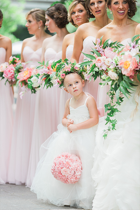 Bridal party portrait with flower firl at Marie Gabrielle